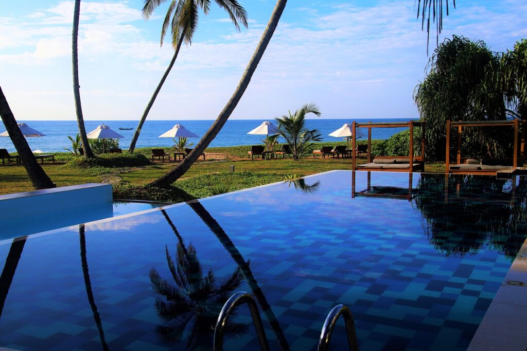 swimming pool, ocean, palm trees-3204359.jpg